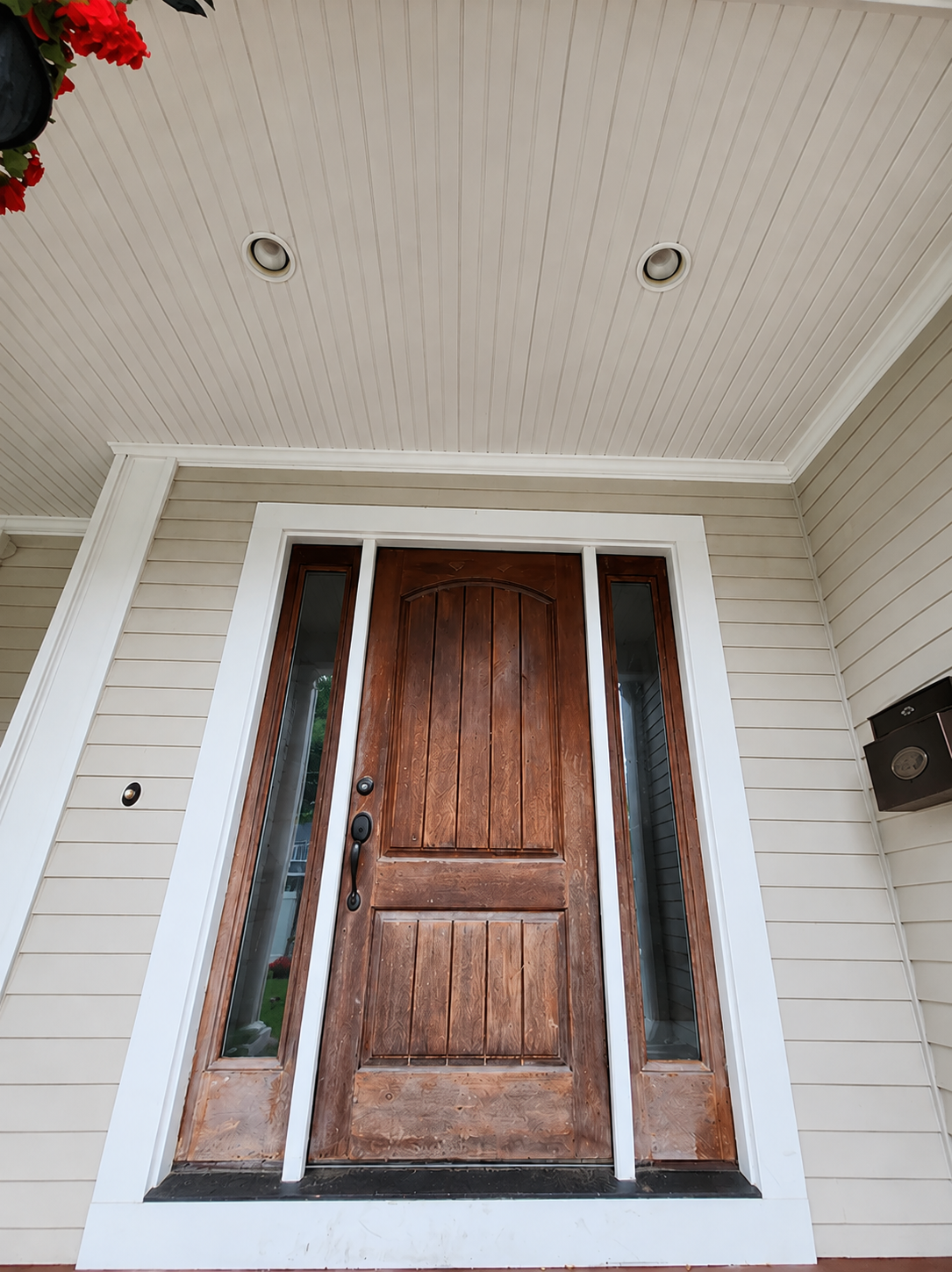 Residential door exterior painting project by Alinton's Painting in Massachusetts